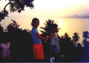 Daughter Eliza and Nephew Jason watching the sun set over Lake Taal