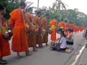 Monks collecting alms.