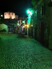 One of old Mostar's main streets at night, near the Marshall Pub.