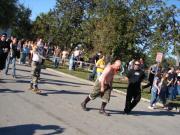 Voodoo Fest... Yes he is pulling someone with wires attached to piercings... Voodoo Fest... Yes he is pulling someone with wires attached to piercings...