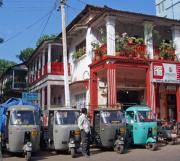 Portuguese houses and autorickshaws Portuguese houses and autorickshaws