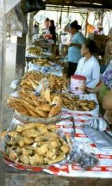 Warungs with fried fish