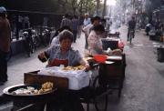 Flying vendors preparing breakfast, half an hour later the street was empty again