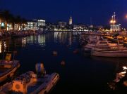Split's fishing harbour at night, a couple of ferries leave from the same waterfront. Split's fishing harbour at night, a couple of ferries leave from the same waterfront.