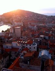 The view of sunset over the old part of Split seen from the bell tower of the cathedral.