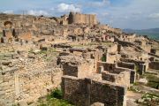 The ordinary households in the foreground and the Lycinian Baths in on the top of the hill. The ordinary households in the foreground and the Lycinian Baths in on the top of the hill.