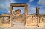 The door of the House of el-Achab, and the Capitol seen through it. The door of the House of el-Achab, and the Capitol seen through it.
