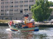 Fishing boat arriving with catch