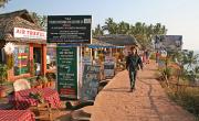 The cliff-top path is lined with restaurants and shops. The cliff-top path is lined with restaurants and shops.