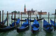 Gondole parked at Piazza di San Marco with a view over Lido Gondole parked at Piazza di San Marco with a view over Lido