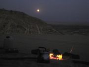 Campfire under a full desert moon Campfire under a full desert moon