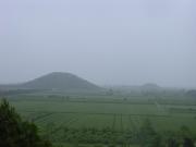 The valley with a tomb in the distance.