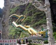 Longest escalator in the world, in the shape of a yellow dragon. Rawr!