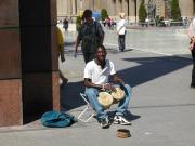 African tourist playing JOTA alone in Plaza Pilarica African tourist playing JOTA alone in Plaza Pilarica