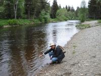 Touching the river water that flows into the Vltava River
