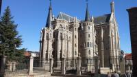 Old stone bridge and Gaudi's palace