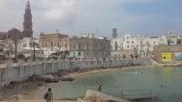 Hilly town of Ostuni and old port Monopoli