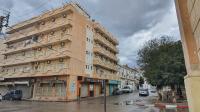 In the rain to Batna